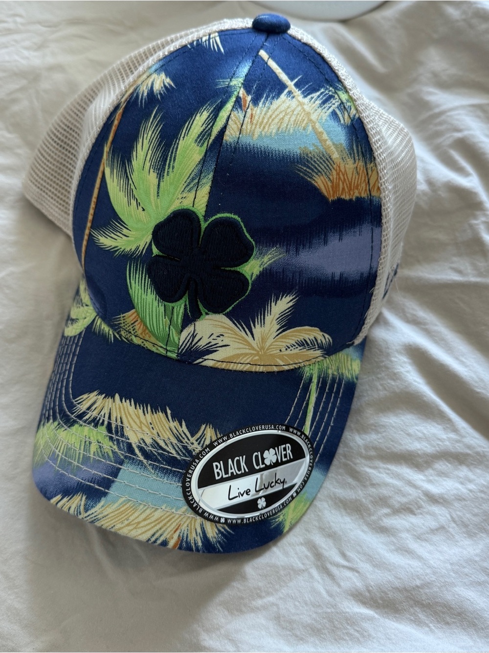 Black Clover brand hat with palm trees motifv
